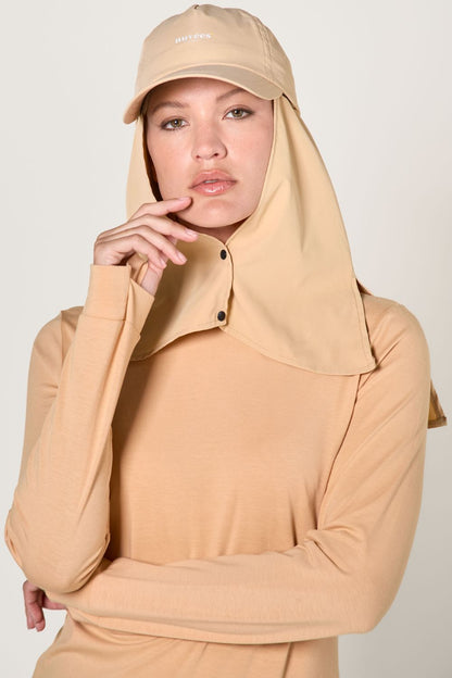 Casquette anti-UV beige pour femme avec protection solaire, idéale pour activités en extérieur et UPF 50+.