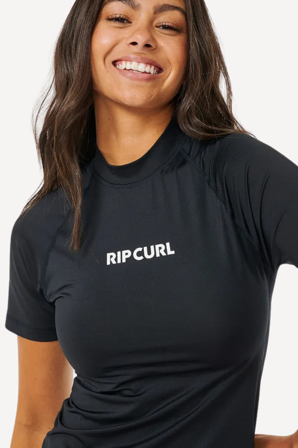 T-shirt de bain anti-UV noir Rip Curl pour femme, léger et élégant, offrant protection UPF50+ au soleil.